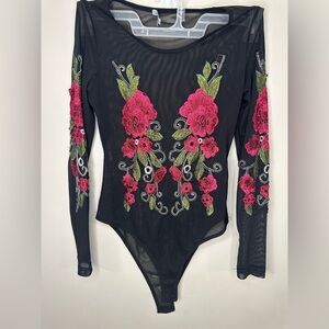 Women’s Charlotte Russe size xs flower print black body suit